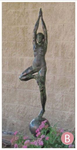 sculpture of person in yoga pose